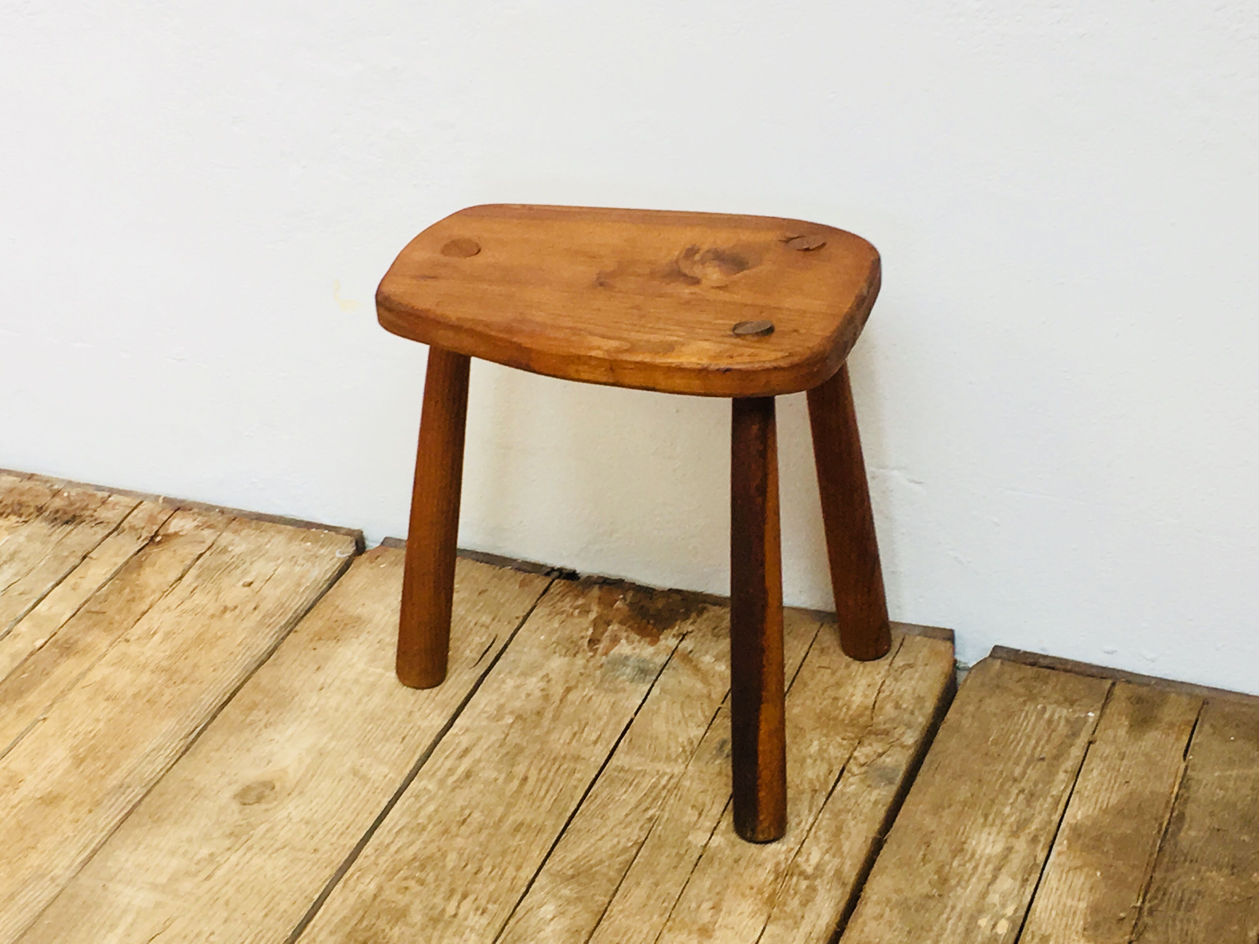 Wooden tripod stool