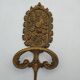 Brass coat rack with floral decoration