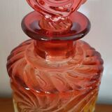 BACCARAT - bottle from the “Multiple Rosaces” series - 21 cm - tinted pink crystal