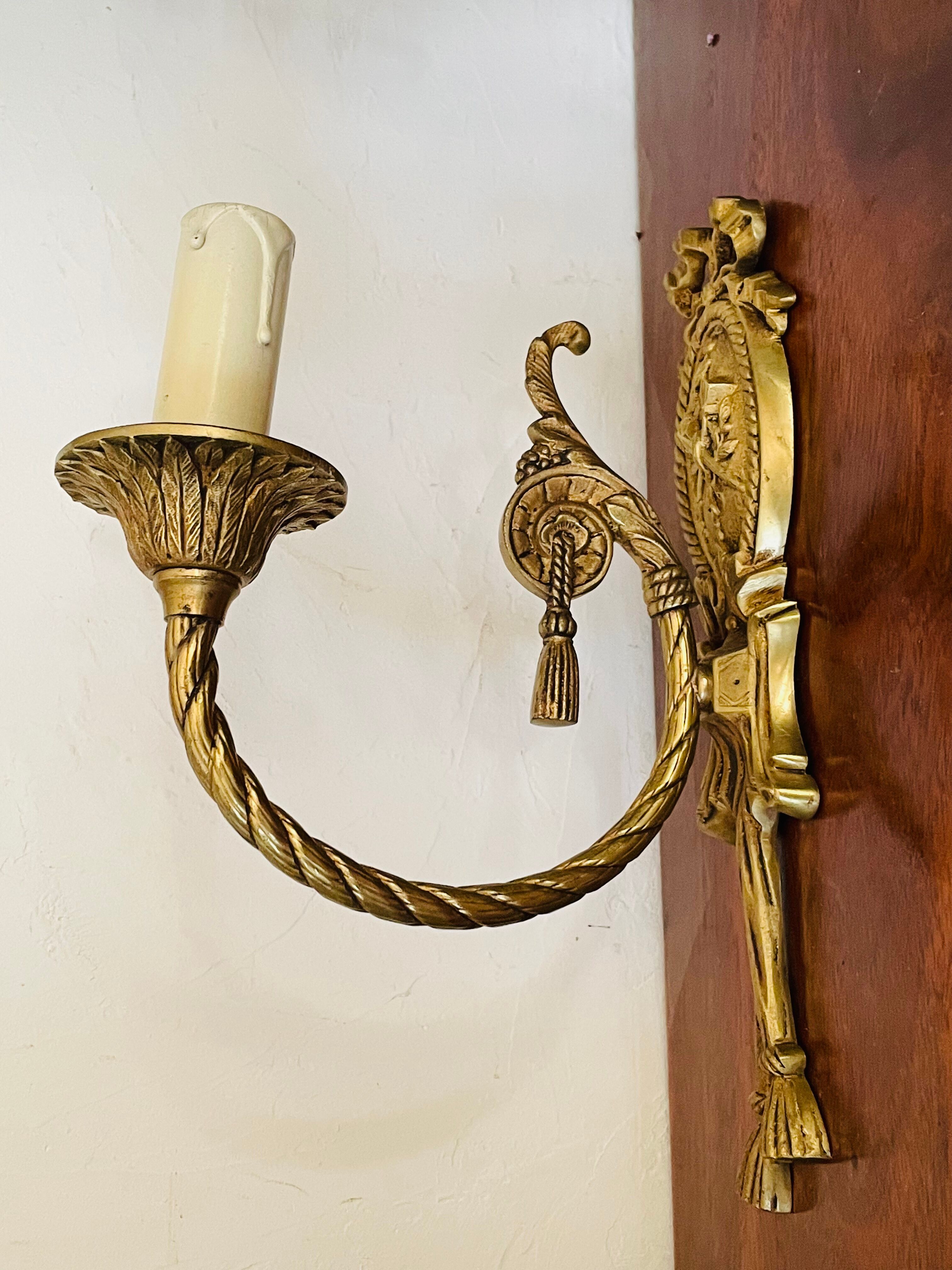 Pair of gilded bronze wall lamps Louis XVI style