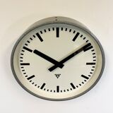 Grey industrial factory wall clock from pragotron, 1960s