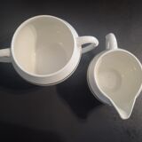 1 milk jug and 1 sugar jar