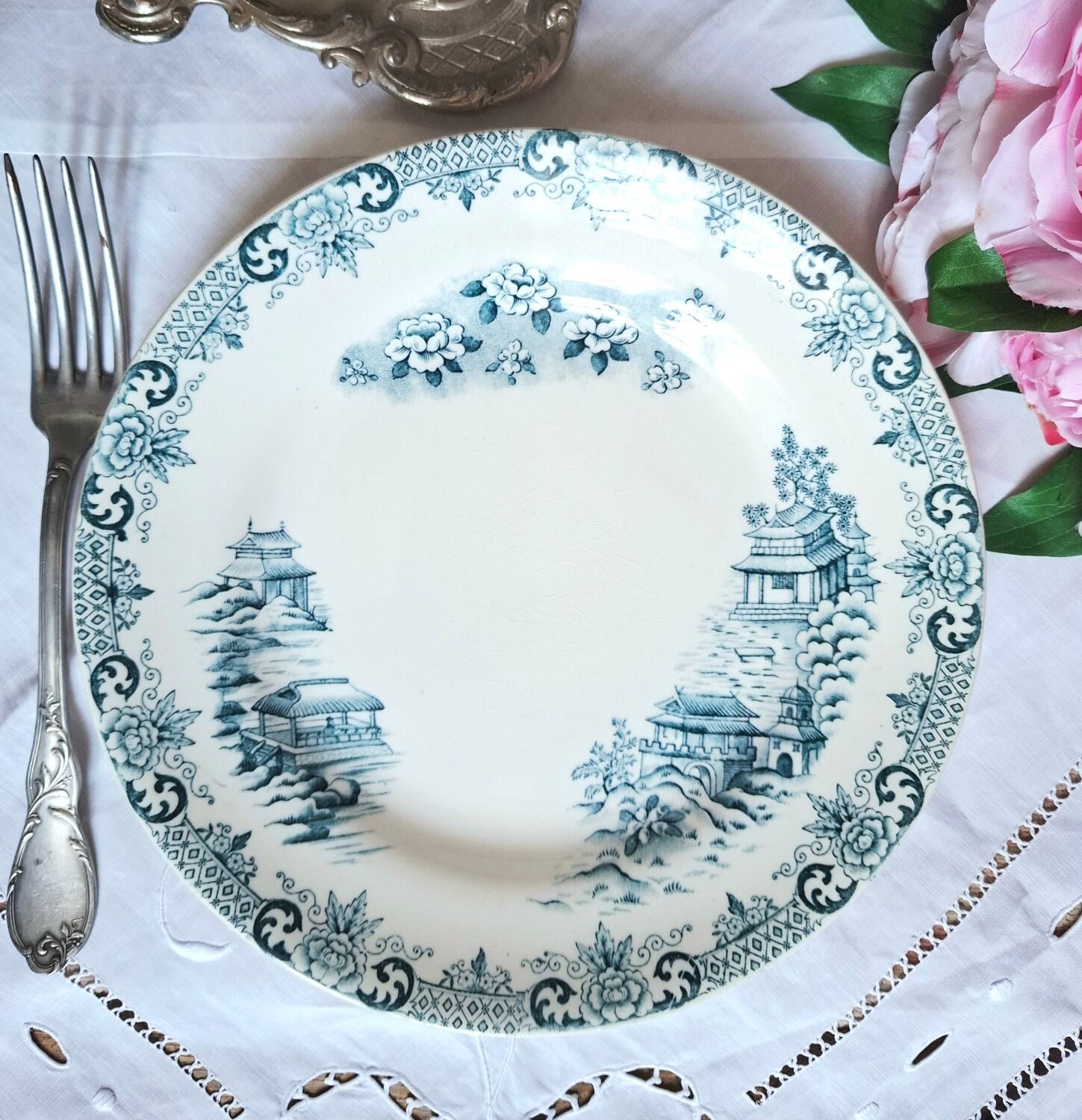 Mismatched antique flat plates made of ironstone accompanied by