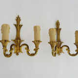 Old pair of wall sconces with double fires in bronze, seventies