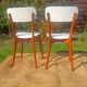 vintage wooden chairs with white faux leather