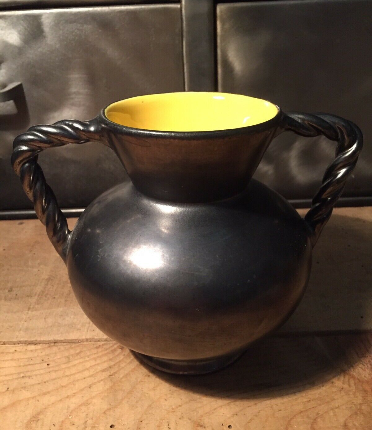 Iridescent black and yellow ceramic vase