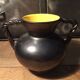 Iridescent black and yellow ceramic vase