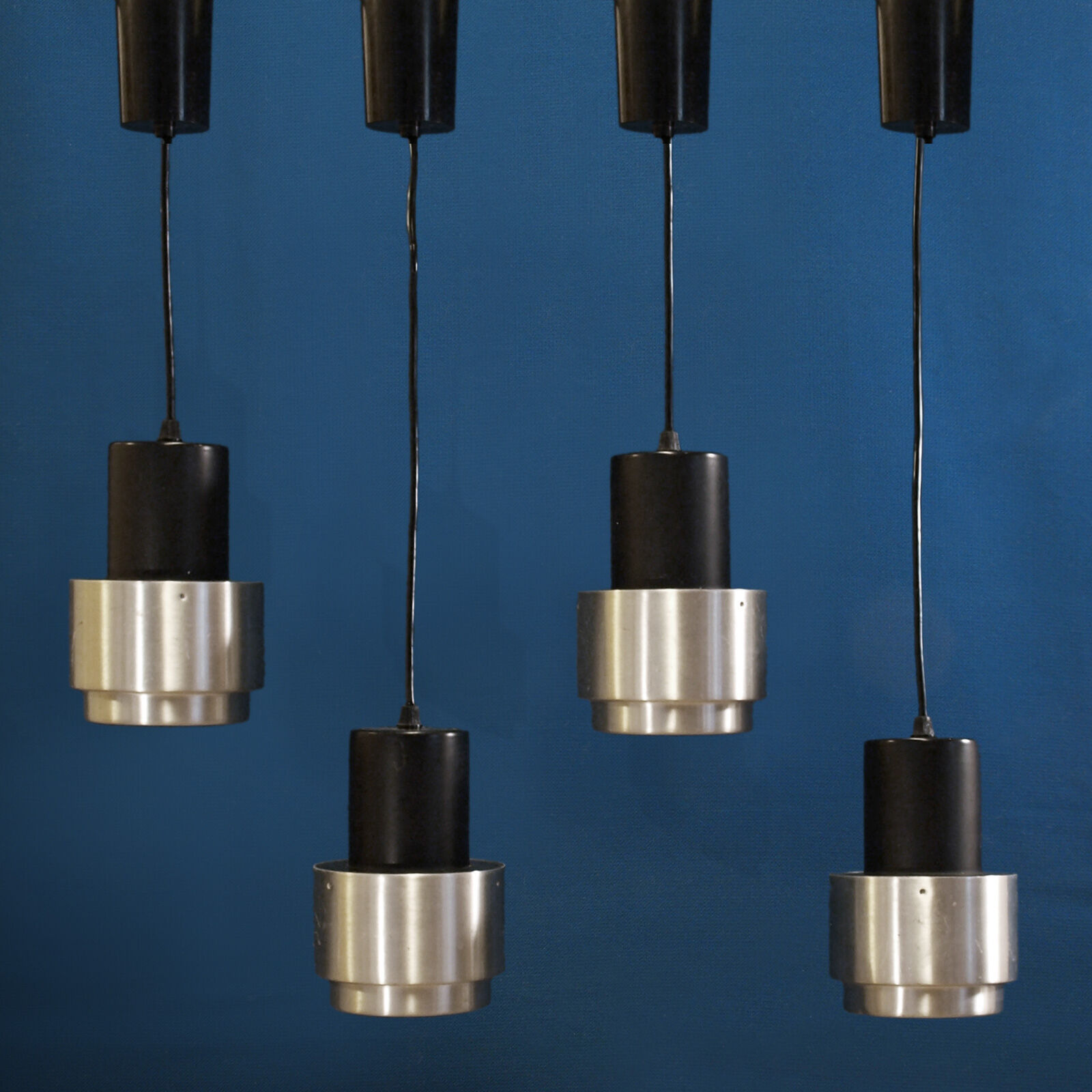 Suite de 4 suspensions space age en inox brossé
