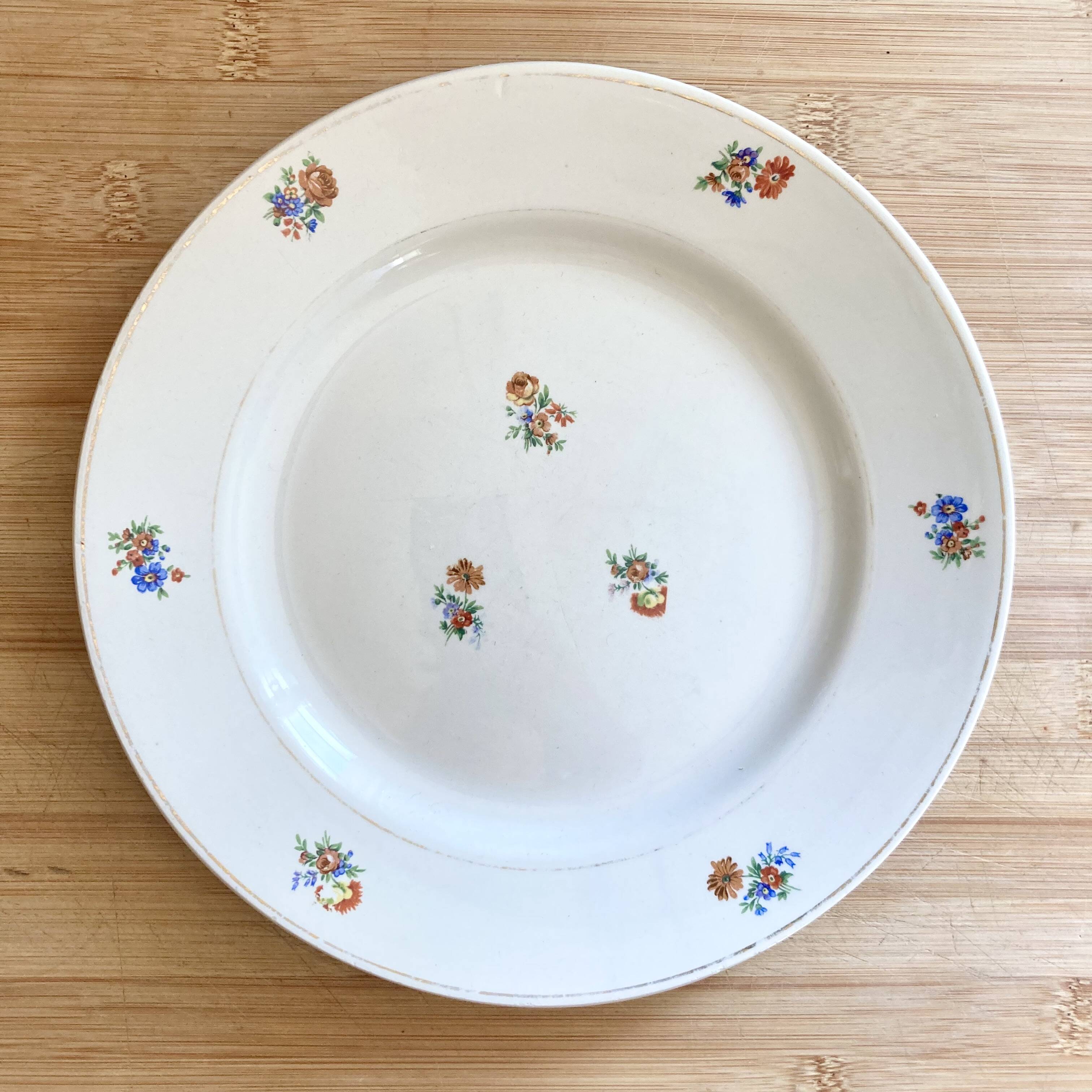 8 mismatched old plates