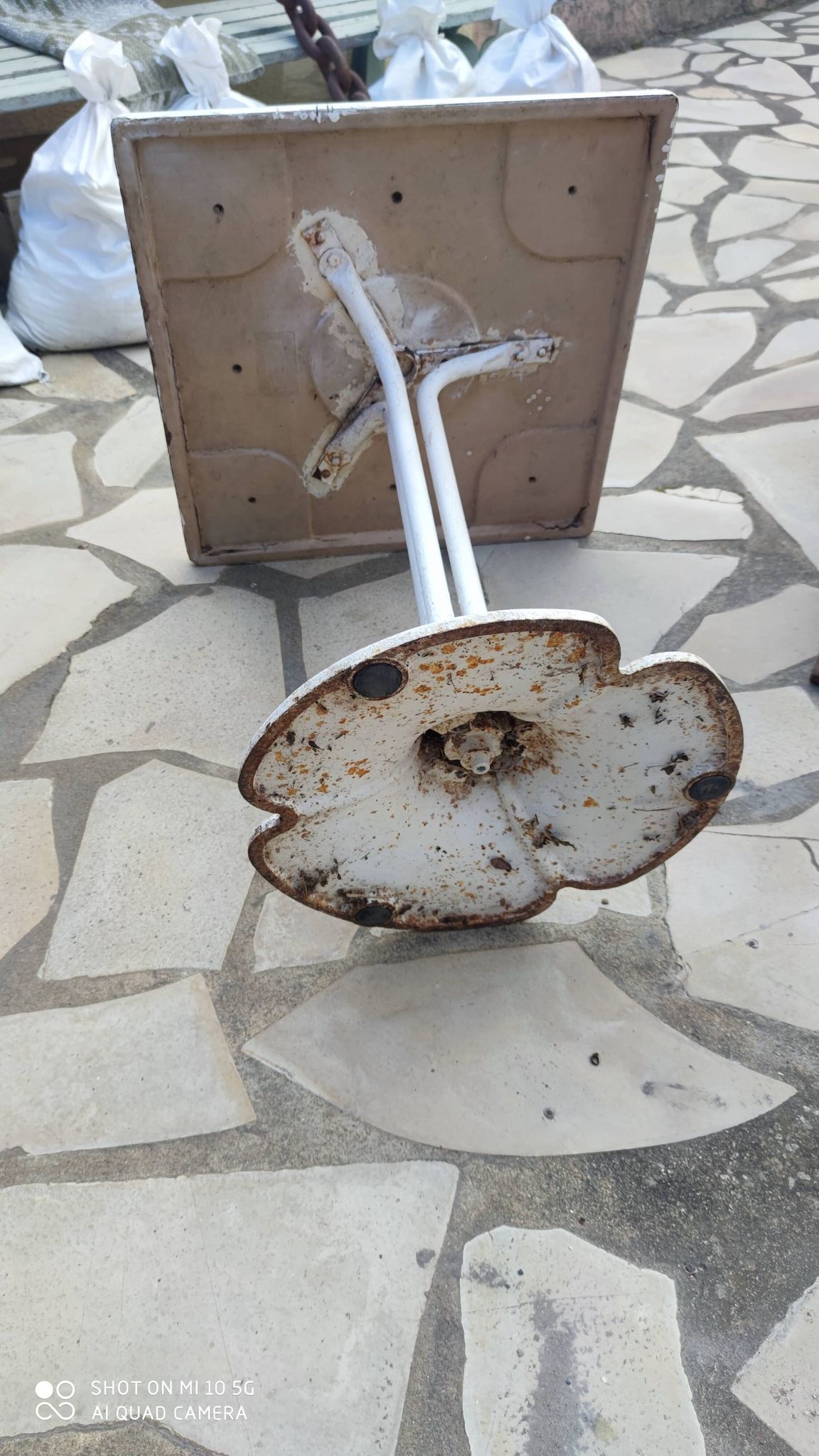 Garden or bistro table with steel and fiberglass base and top, circa 1970