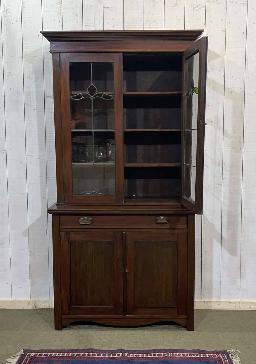 Early 20th century English two-section mahogany bookcase