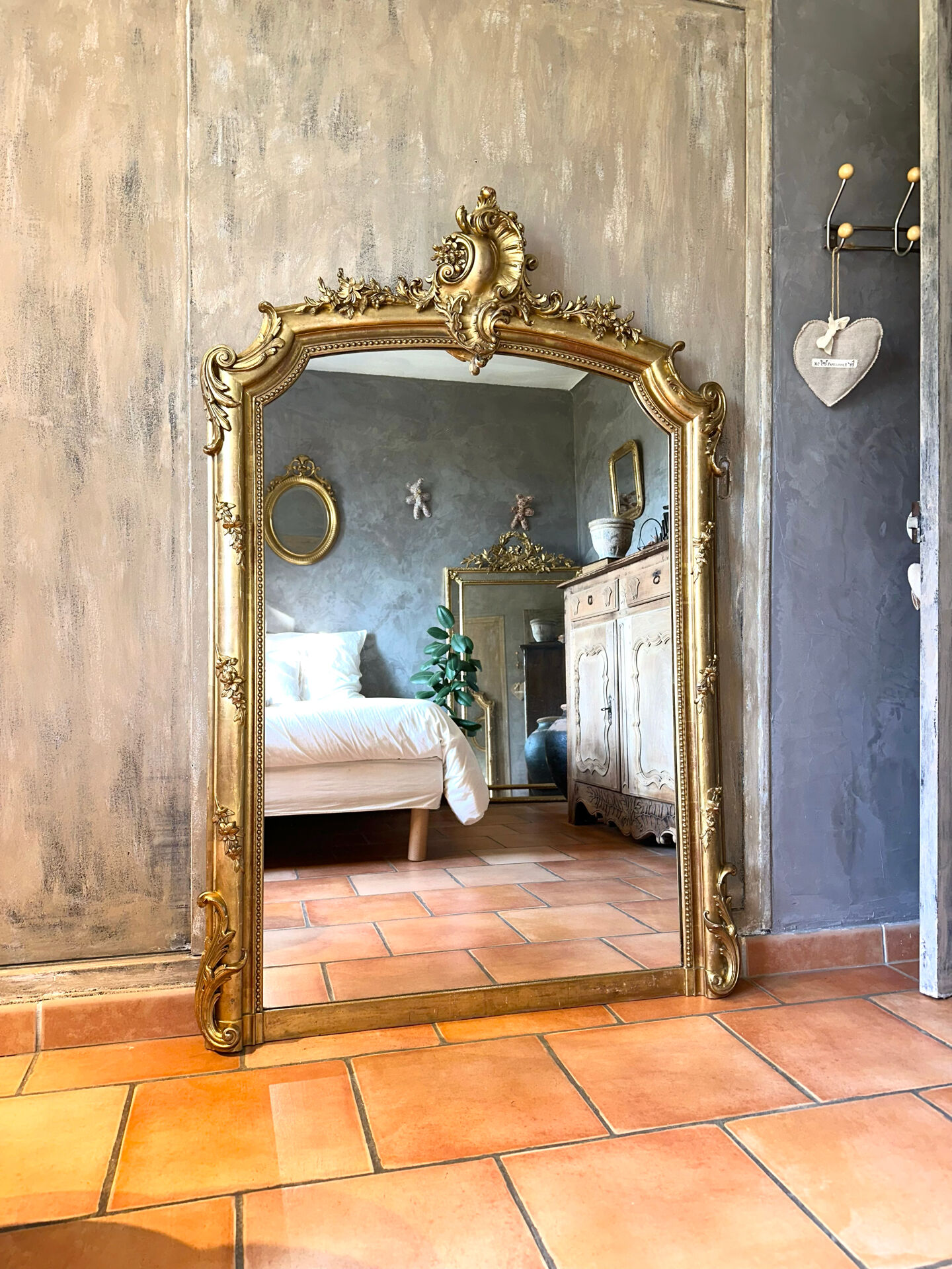 19th-century gilded antique pediment mirror