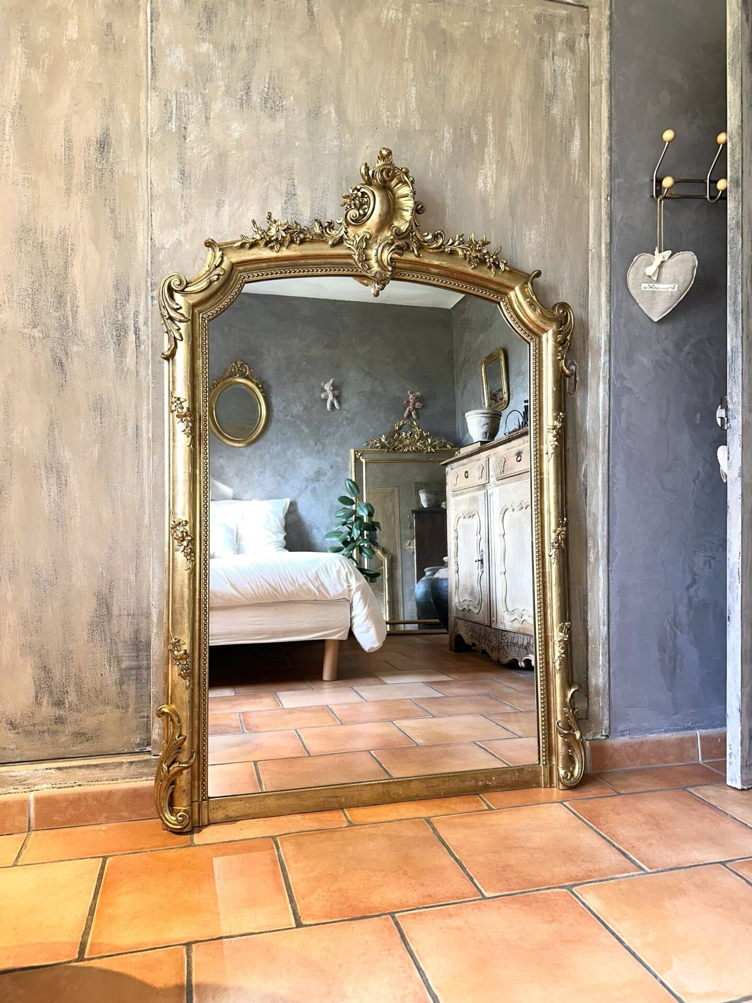 19th-century gilded antique pediment mirror