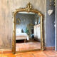 19th-century gilded antique pediment mirror