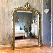 19th-century gilded antique pediment mirror