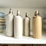 4 beige glazed stoneware bottles
