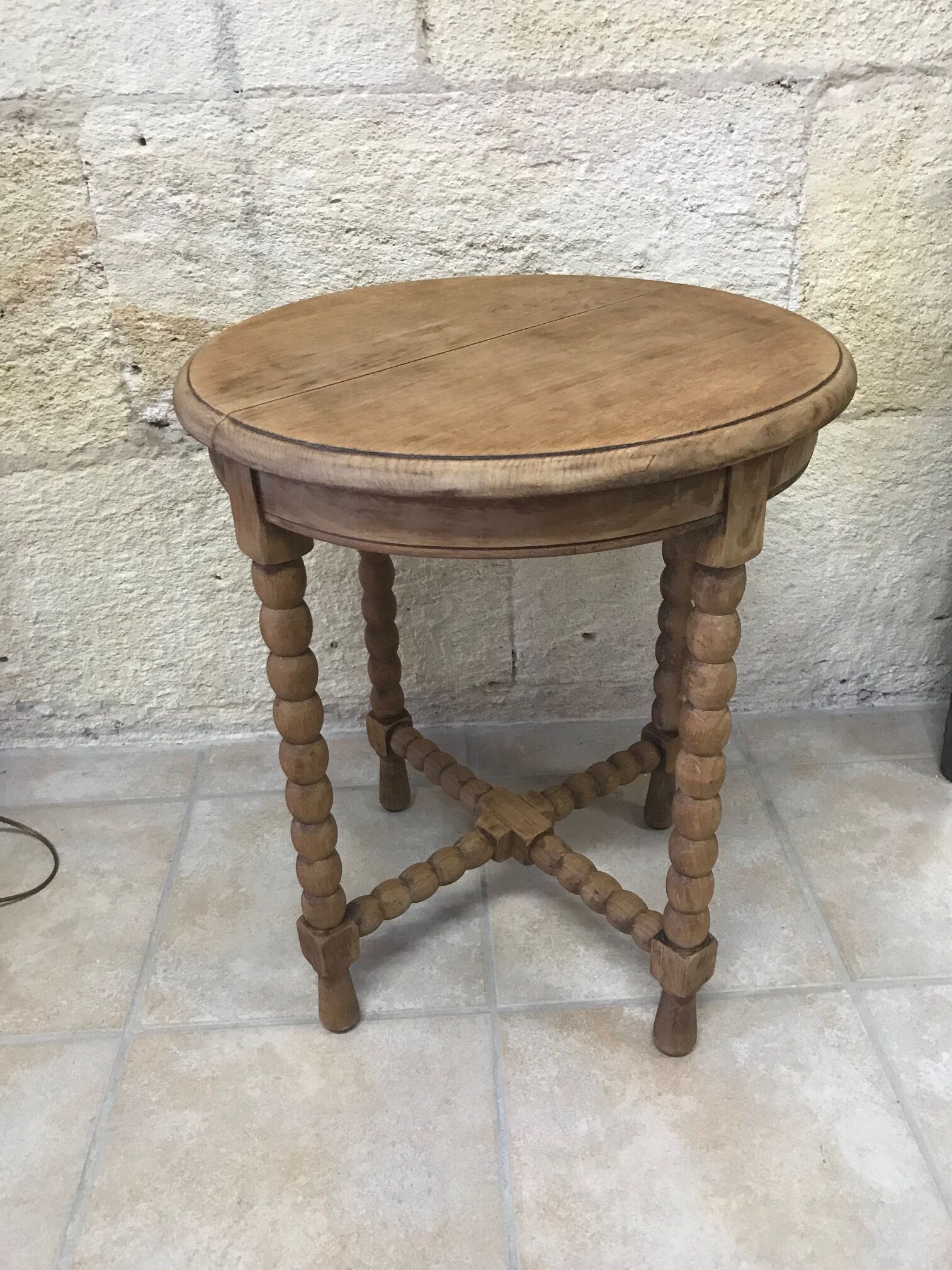 Round wooden side table