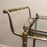 Neoclassical style rolling table in silvered brass