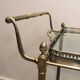 Neoclassical style rolling table in silvered brass