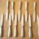11 silver metal knives