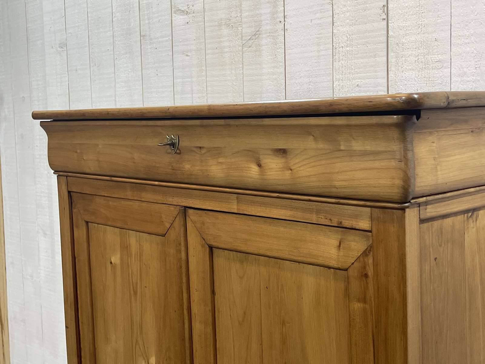 Small Louis Philippe 19th century cherry wood wardrobe with a drawer at the top