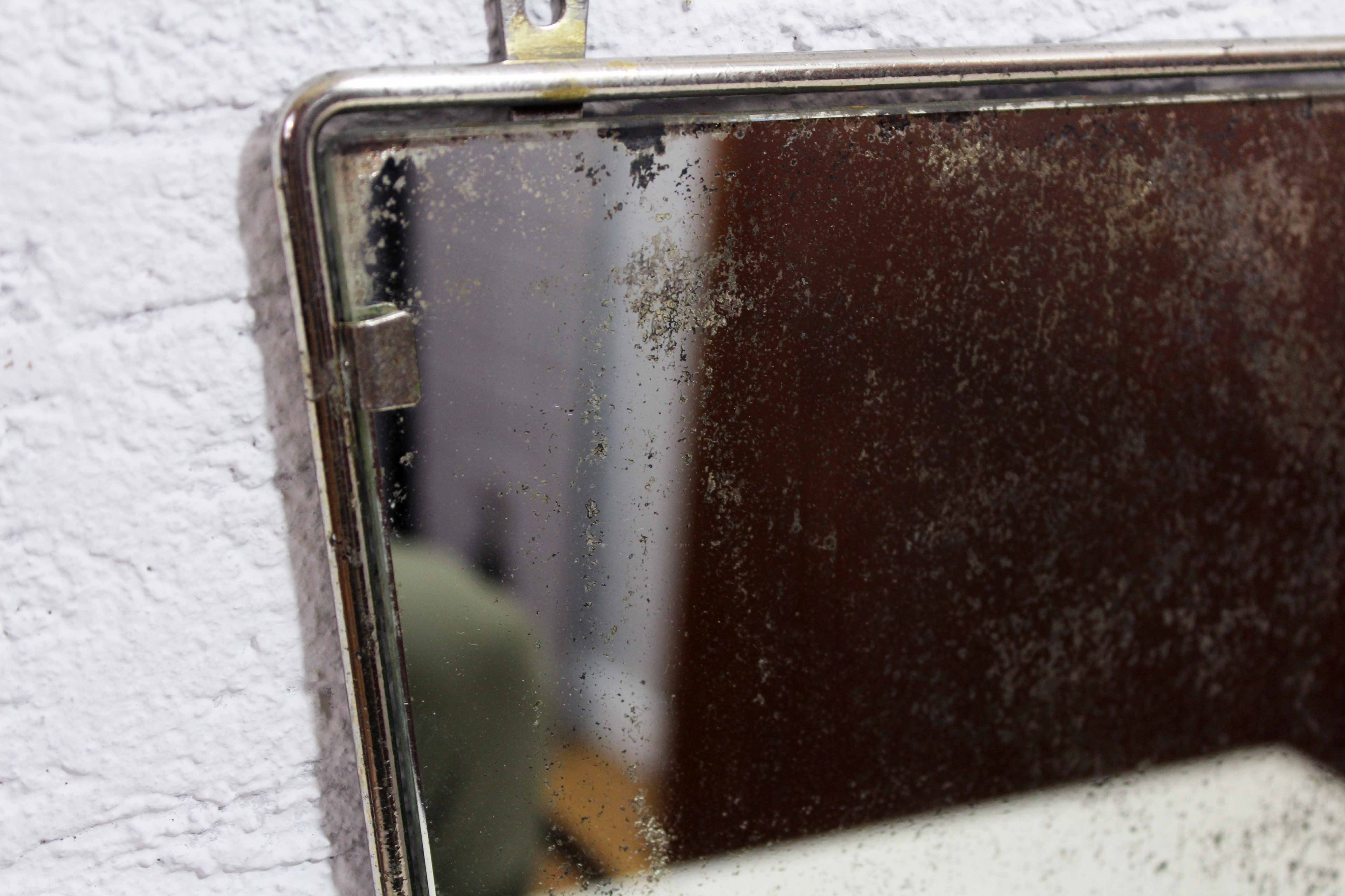 Wall-mounted barber mirror