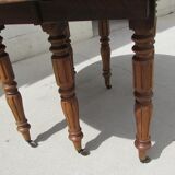 Table 6 feet with flap, opening on 2 extensions, Walnut