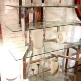 Articulated presentation shelf in chrome and glass. Italy 1970s