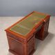 Antique mahogany desk with leather and bronze writing pad, 20th century.
