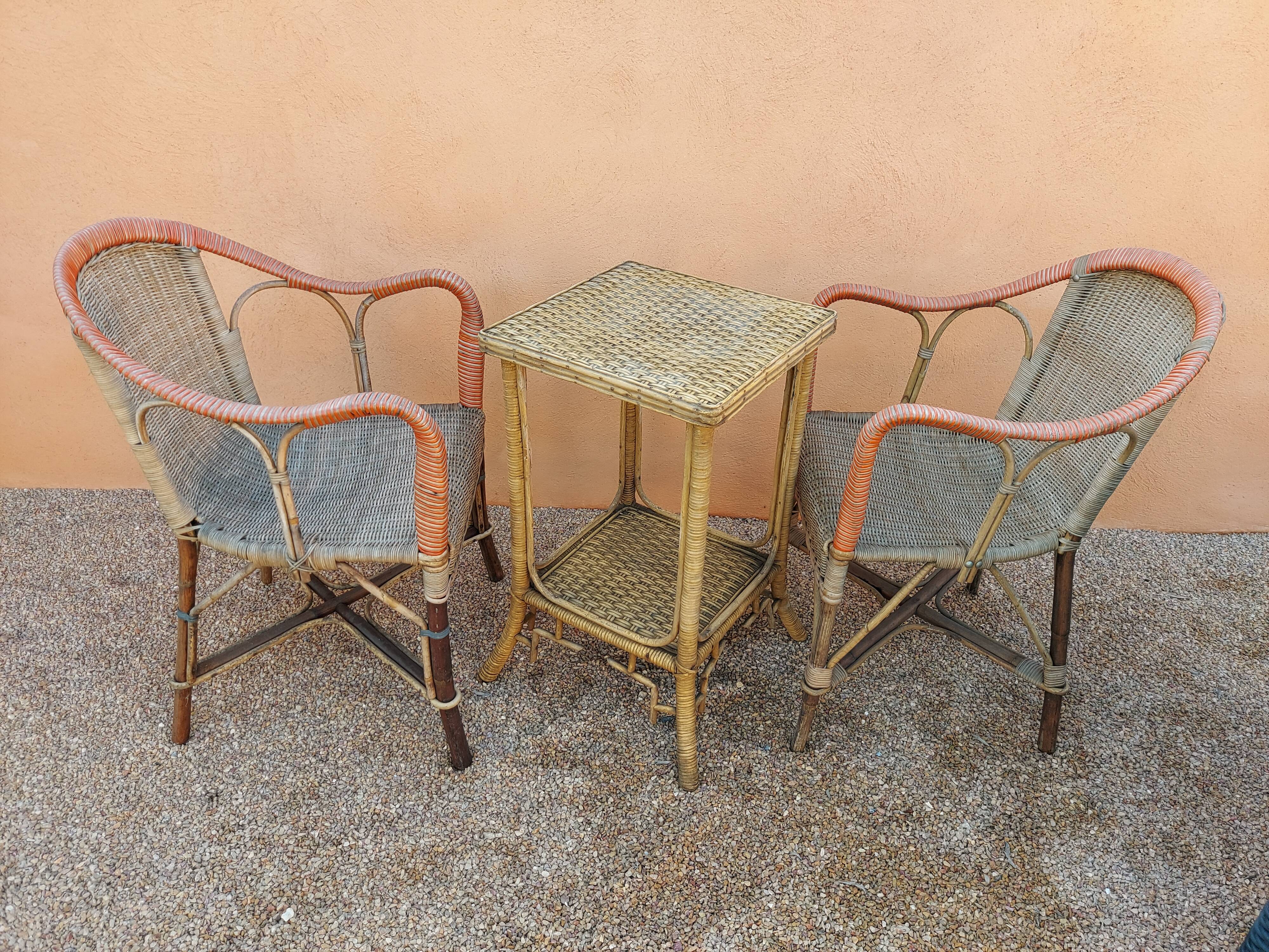 Pair of armchairs and rattan gueridon 1900s