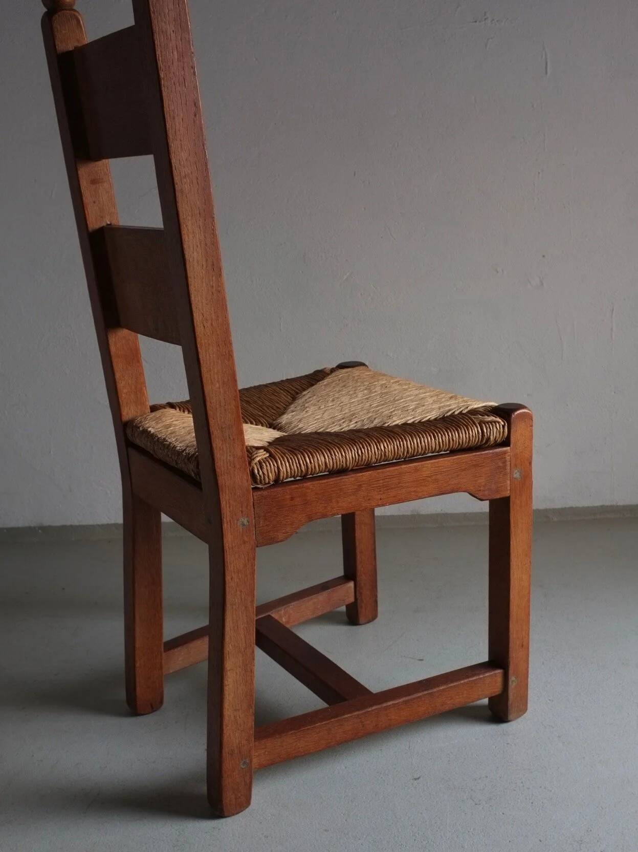 4 brutalist oak rush seat chairs | France | 1960s