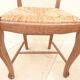 8 Straw chairs with high backs in solid wood