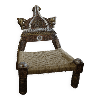 Chair in carved wood and rope