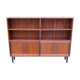 Low rosewood library with sliding doors and drawers, Denmark 1960.