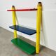 Wall-mounted pencil shelf for children