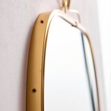 Metal and brass framed mirror