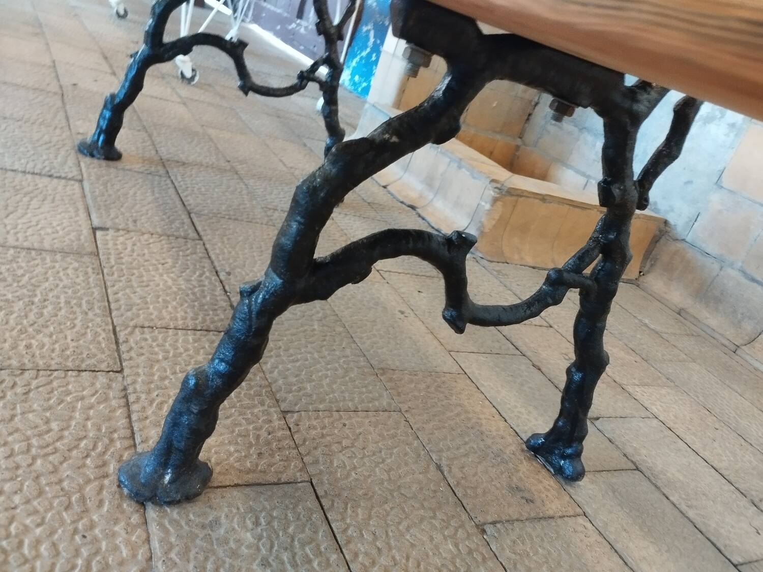 Antique garden bench with cast iron legs