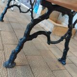 Antique garden bench with cast iron legs