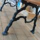 Antique garden bench with cast iron legs