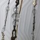 Vintage tassel chandelier has 2 glass and brass crowns