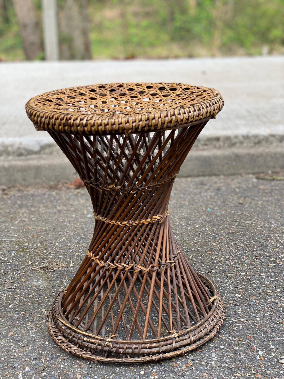 Round tamtam diabolo stool in rattan and woven wicker.