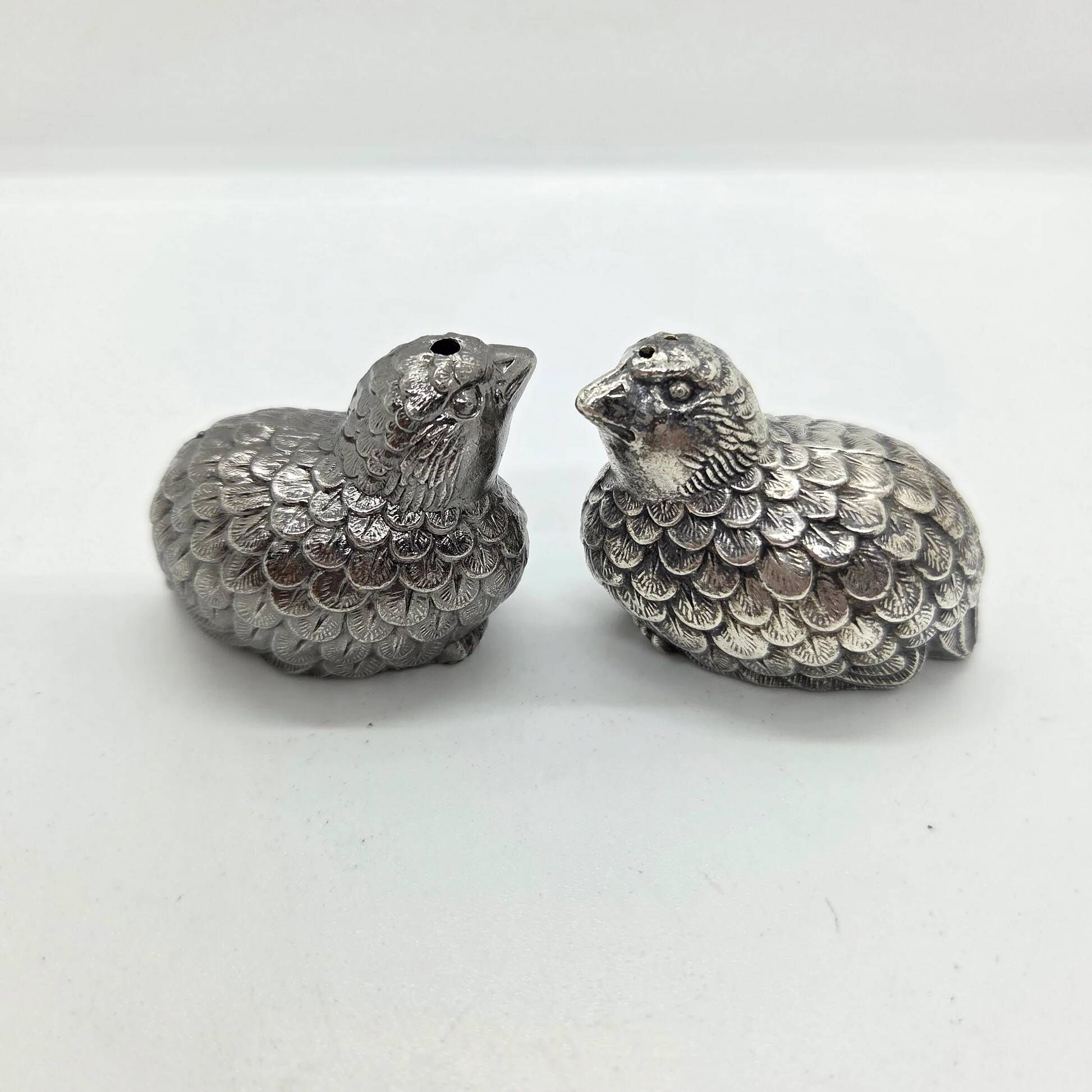 Pair of silver-plated metal bird salt and pepper shakers