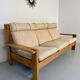 Three-seater canapé in solid oak with Scandinavian design fabric from the 1970s.
