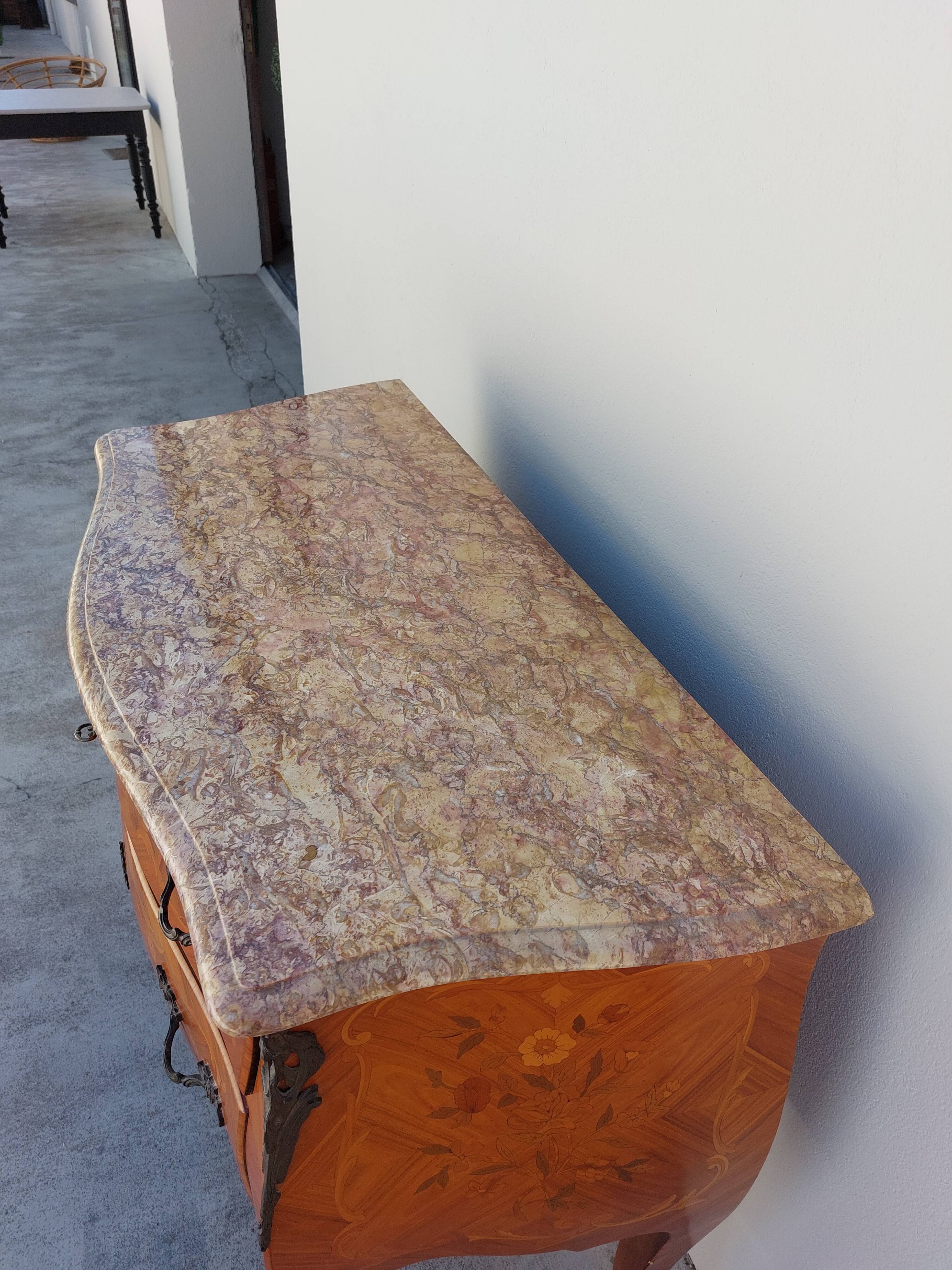 Louis XV chest of drawers in rosewood marquetry