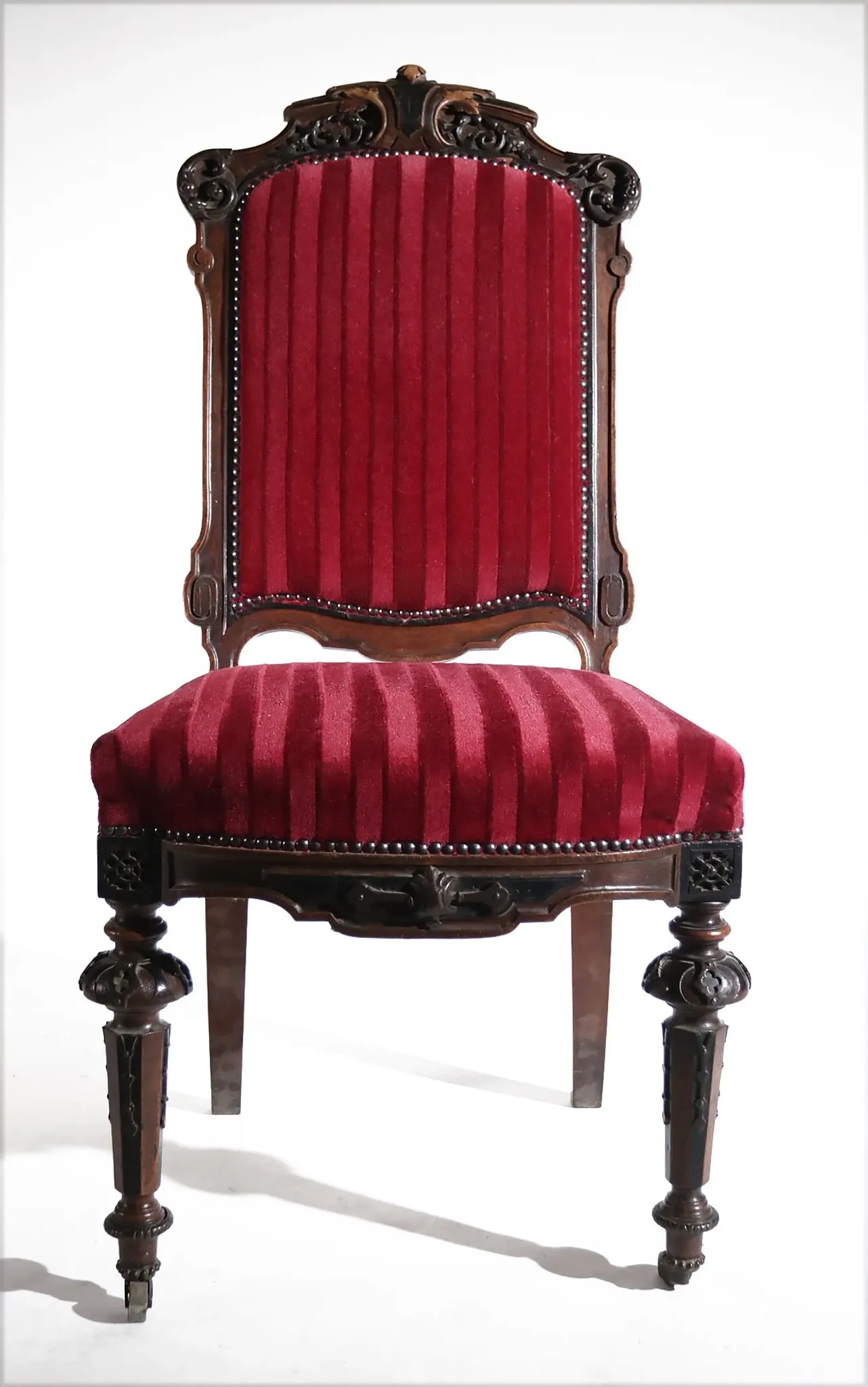 Nineteenth-century French carved chair with red velvet