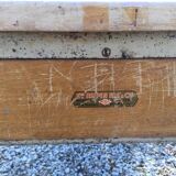 Vintage modernist table with metal tubular base and top covered with oilcloth.