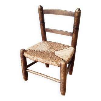 Vintage children's chair in wood and straw