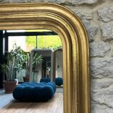 Antique mirror 136.5/98cm Louis-Philippe pearl-gilded with gold leaf.