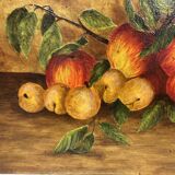 Table with apples, plums and apricots