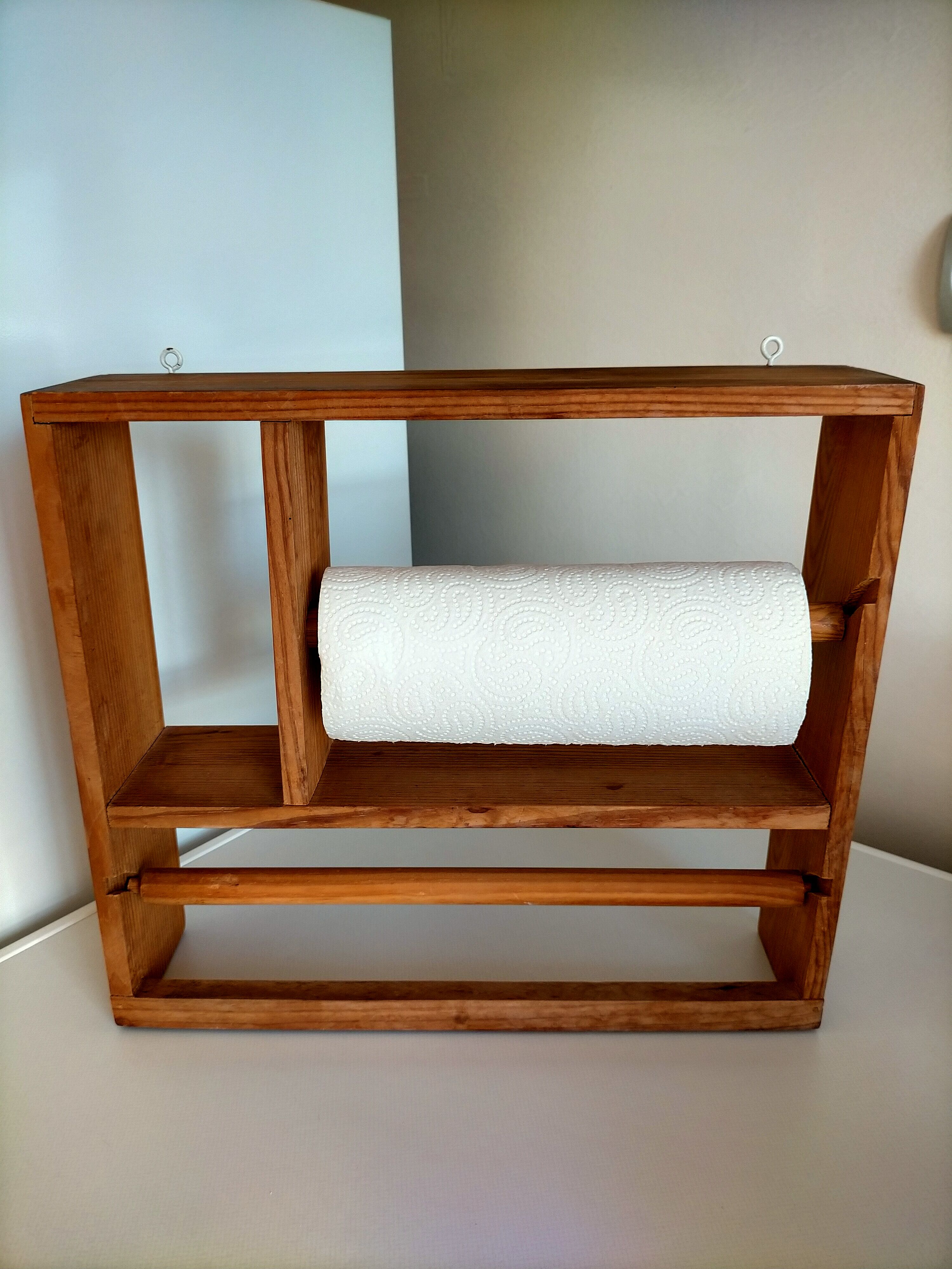 Wooden shelf with unroller wipes everything